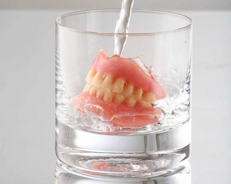 Denture In A Glass